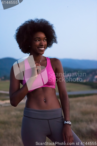 Image of young black woman in nature