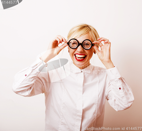 Image of bookworm, cute young blond woman in glasses, blond hair, teenage