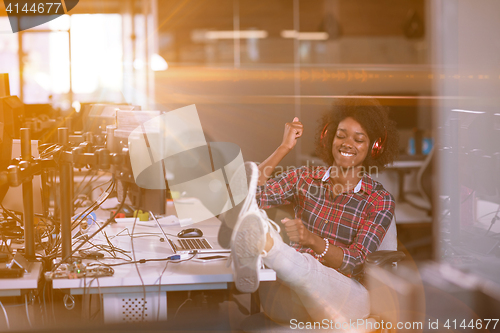 Image of portrait of a young successful African-American woman in modern 