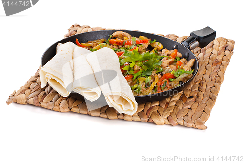 Image of traditional mexican beef fajitas with tortillas