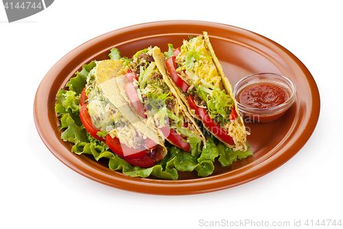 Image of beef tacos with salad and tomatoes salsa