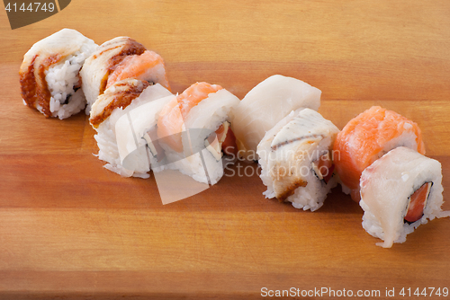 Image of Closeup japanese sushi on wooden plate