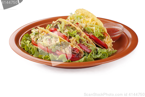 Image of beef tacos with salad and tomatoes salsa