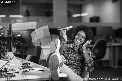 Image of portrait of a young successful African-American woman in modern 