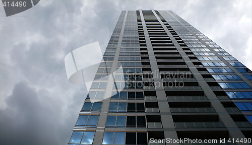 Image of upstairs building and stormy sky