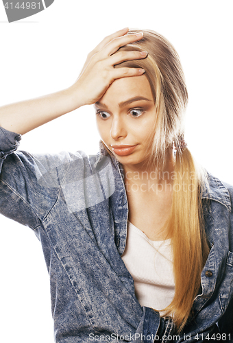 Image of young blond woman on white backgroung gesture thumbs up, isolate