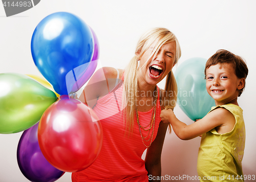 Image of pretty real family with color balloons on white background, blon