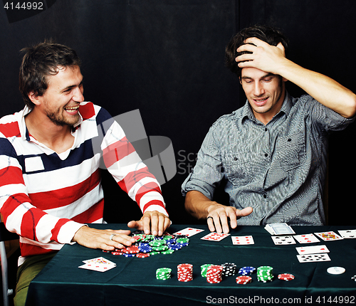 Image of young people playing poker