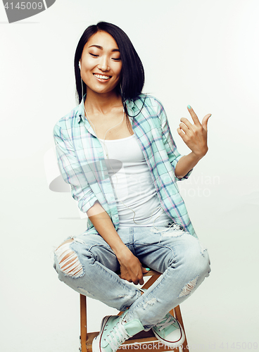 Image of young pretty asian woman posing cheerful emotional isolated on white background, lifestyle people concept