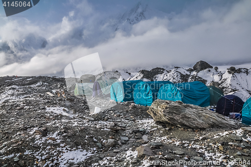 Image of Blue tents on rocks