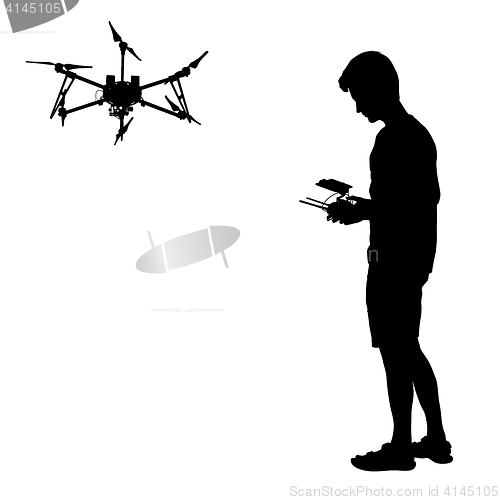 Image of Black silhouette of a man operates unmanned quadcopter illustration