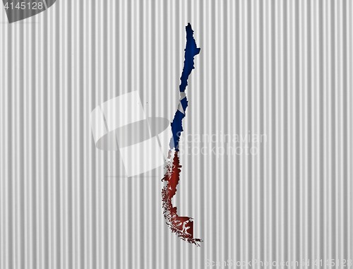 Image of Map and flag of Chile on corrugated iron