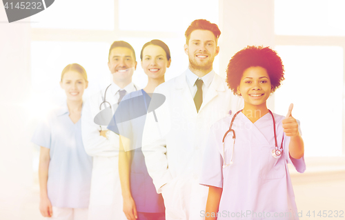 Image of group of happy doctors at hospital