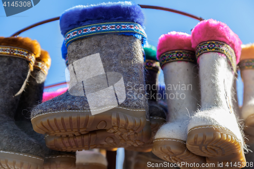 Image of Warm shoes for children made of felt (boots)