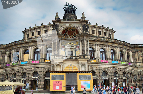 Image of DRESDEN, GERMANY – AUGUST 13, 2016: Tourists walk and visit on