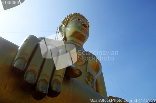 Image of Golden Buddha statue of Big Buddha over blue sky