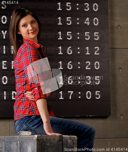 Image of Young Woman Waiting Flight