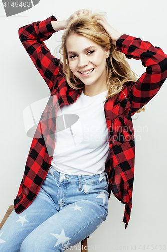 Image of young pretty stylish hipster teen girl posing emotional isolated on white background happy smiling cool smile, lifestyle people concept