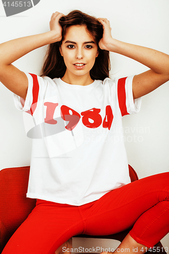 Image of young pretty stylish hipster girl posing emotional isolated on white background happy smiling cool smile, lifestyle people concept