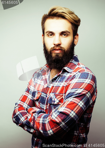 Image of portrait of young bearded hipster guy smiling on white background close up, brutal man, lifestyle people concept