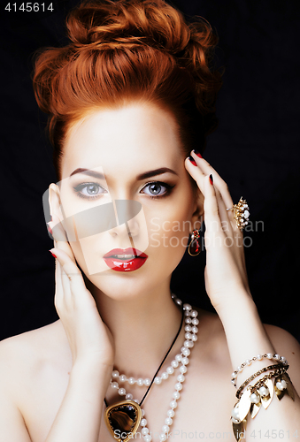 Image of beauty stylish redhead woman with hairstyle and manicure wearing