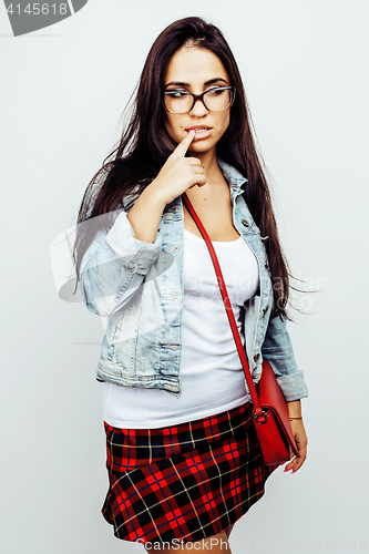 Image of young happy smiling latin american teenage girl emotional posing on white background, lifestyle people concept, school uniform wearing glasses