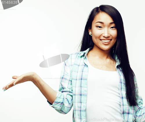 Image of young pretty asian woman posing cheerful emotional isolated on white background, lifestyle people concept