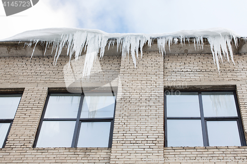 Image of icicles on building or living house facade