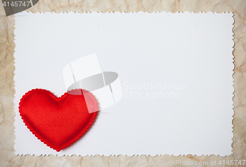 Image of Red hearts on a blank photo paper