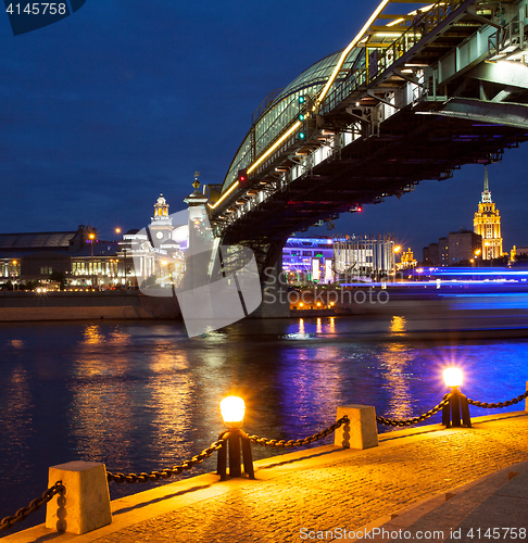 Image of night cityscape on river in Moscow, Russia