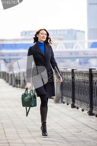 Image of beautiful smiling businesswoman