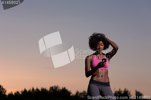 Image of young african american woman in nature