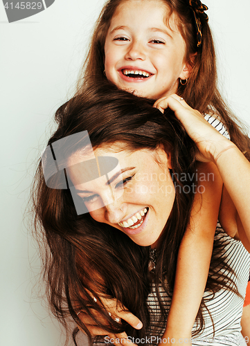 Image of bright picture of hugging mother and daughter happy together, smiling stylish family. lifestyle people concept