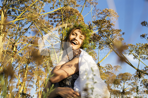 Image of young cute summer girl on green grass outside relaxing happy smiling close up, lifestyle people concept