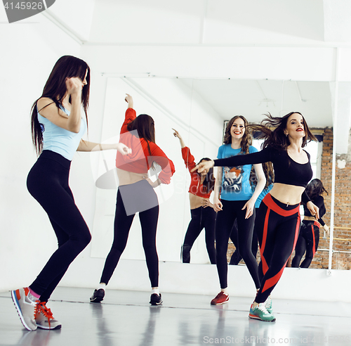 Image of Women doing sport in gym, healthcare lifestyle people concept, modern loft studio