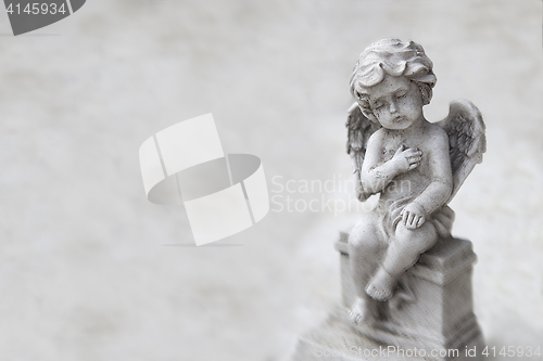 Image of Stone angel, white space