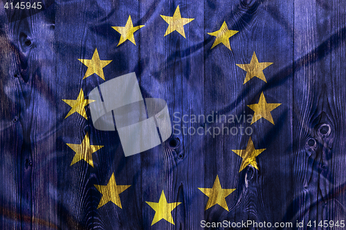 Image of National flag of European Union, wooden background