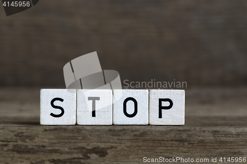 Image of Stop, written in cubes