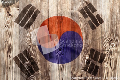 Image of National flag of South Korea, wooden background