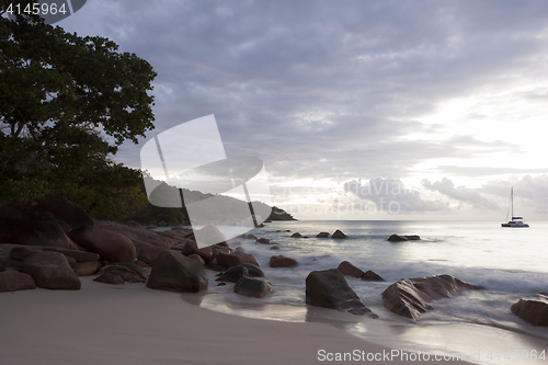 Image of Dramatic coastline at sunset, Anse Lazio  