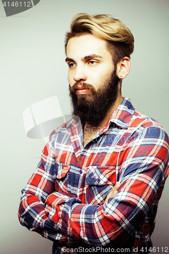 Image of portrait of young bearded hipster guy smiling on white background close up, brutal man, lifestyle people concept