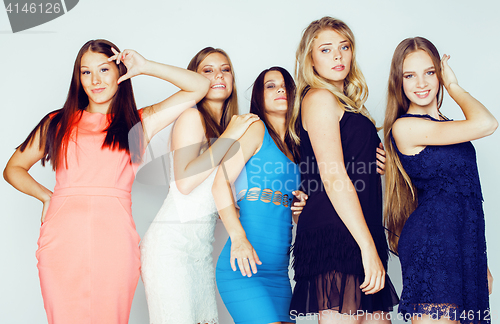 Image of group of many cool modern girls in bright clothers together having fun isolated on white background, happy smiling lifestyle people concept