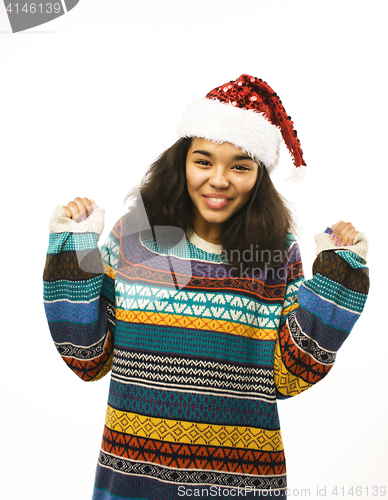 Image of cute young real african hipster girl in santas red hat isolated 