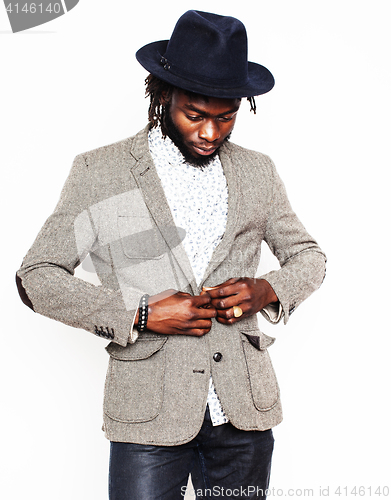 Image of young handsome afro american boy in stylish hipster hat gesturin