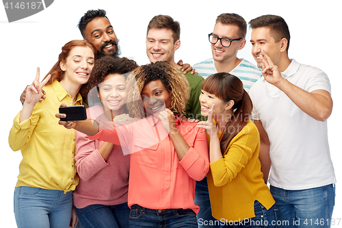 Image of group of people taking selfie by smartphone