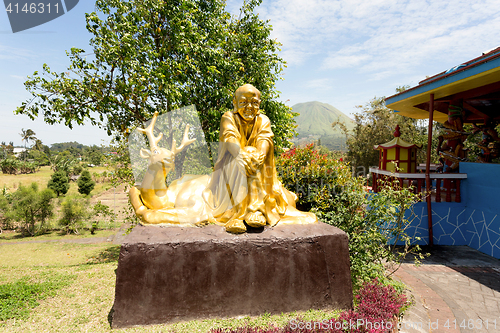 Image of fat monk statue in complex Pagoda Ekayana