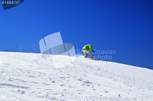 Image of Snowboarder on off-piste slope