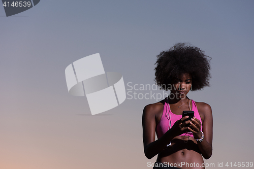 Image of young african american woman in nature