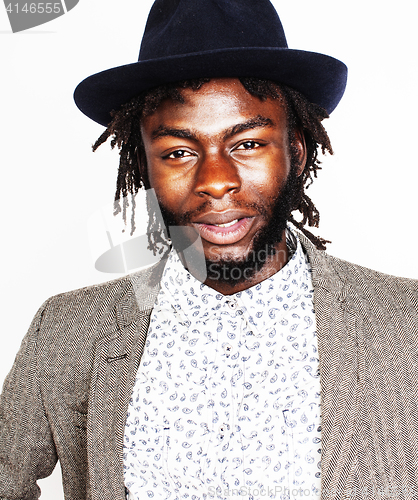 Image of young handsome afro american boy in stylish hipster hat gesturin