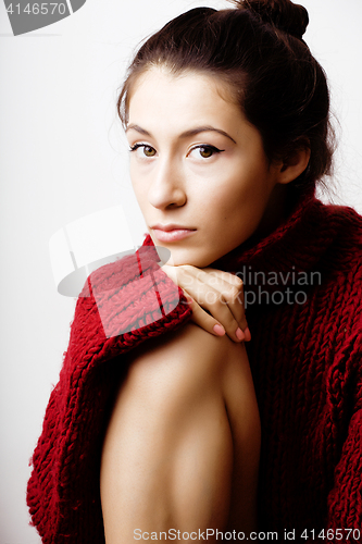 Image of young pretty woman in sweater and scarf all over her face, lifes